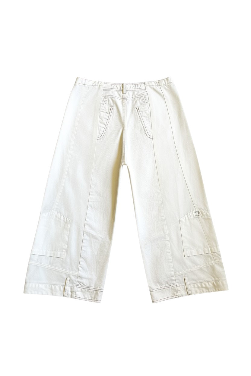Thoughts Reworked off-white wide-leg cropped pants in cotton blend with asymmetric panels and drawstring hem.