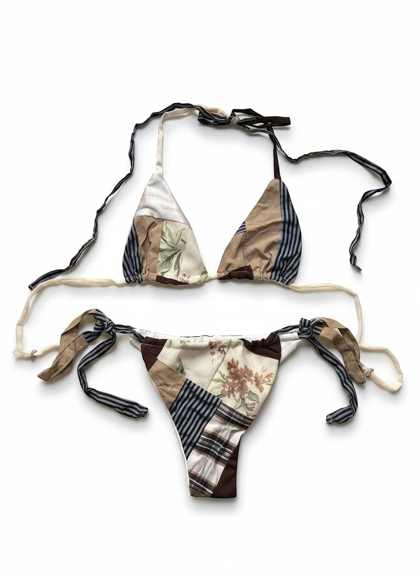 Thoughts Reworked patchwork string bikini set with floral and stripe prints in earthy tones. Halter top and tie-side bottoms.
