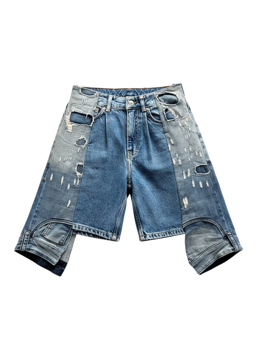 Thoughts Reworked blue denim upcycled shorts with distressed details and unique paneling. One-off design.