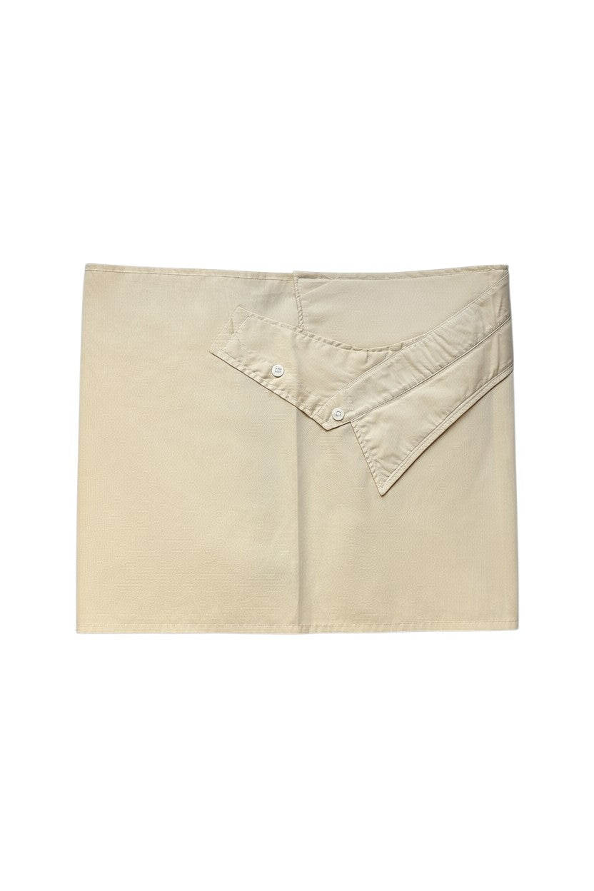 Thoughts Reworked beige asymmetrical button front wrap skirt made from cotton blend with two button closures.