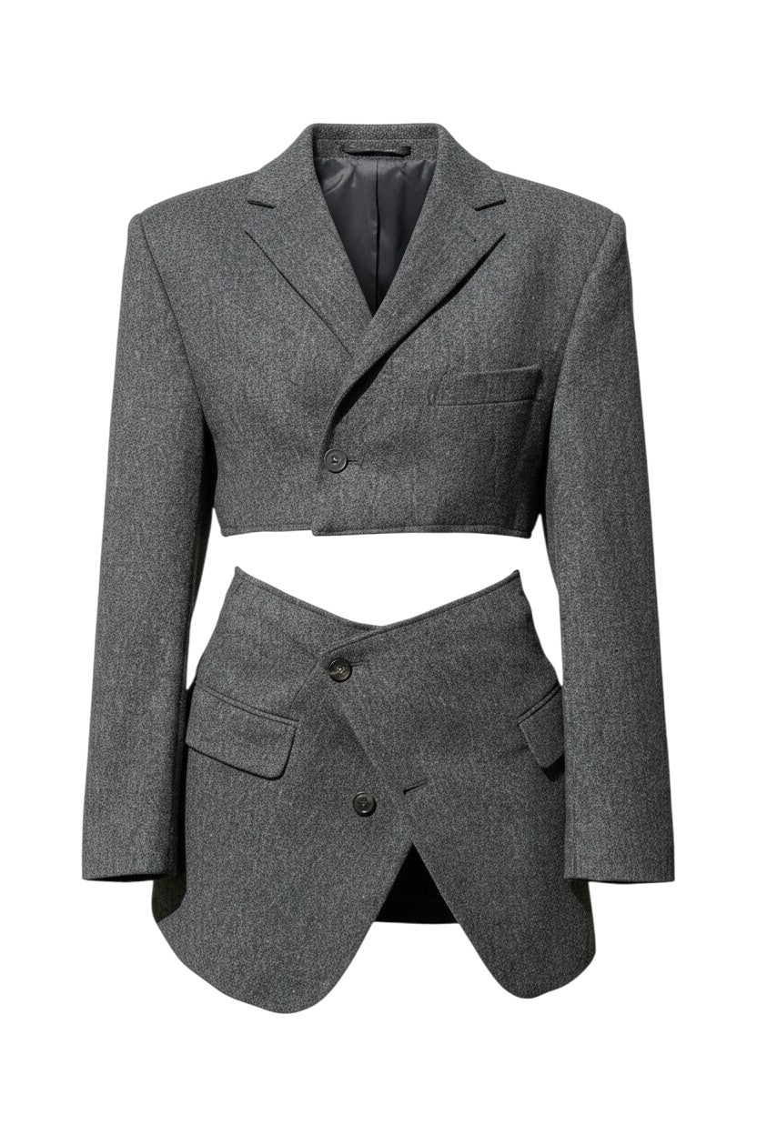 Thoughts Reworked grey wool co-ord set: cropped blazer and asymmetric wrap skirt. Model is 1.70m tall.