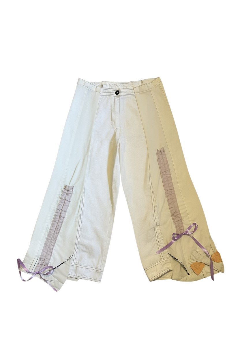 Thoughts Reworked off-white wide-leg cropped pants with lilac ribbon detail and drawstring hems.