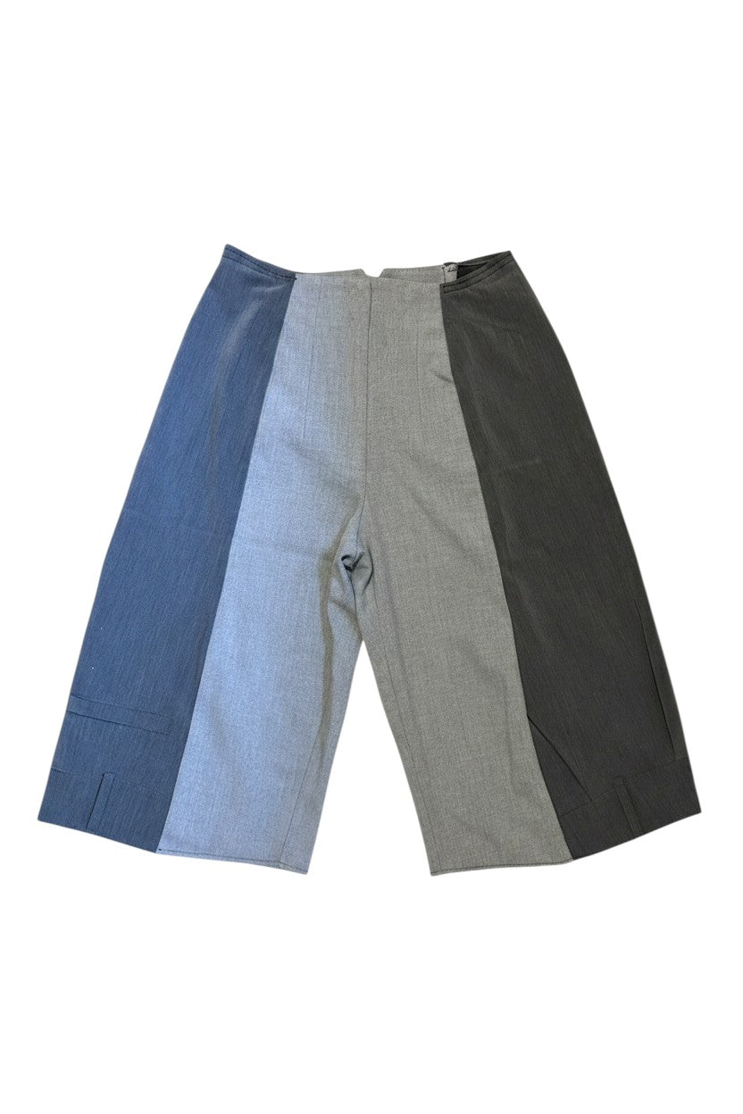 Thoughts Reworked patchwork wide leg cropped trousers in grey and blue, featuring contrasting fabric panels and a relaxed fit.