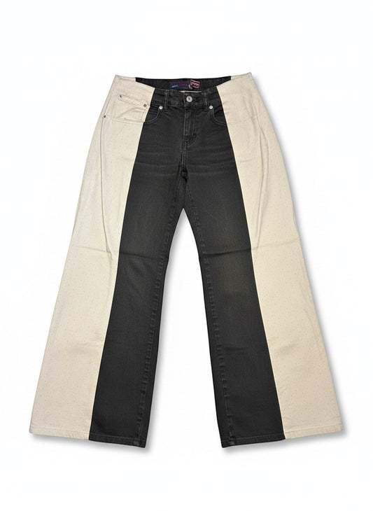 Thoughts Reworked black and beige patchwork wide leg denim jeans with subtle dot pattern on beige panels.