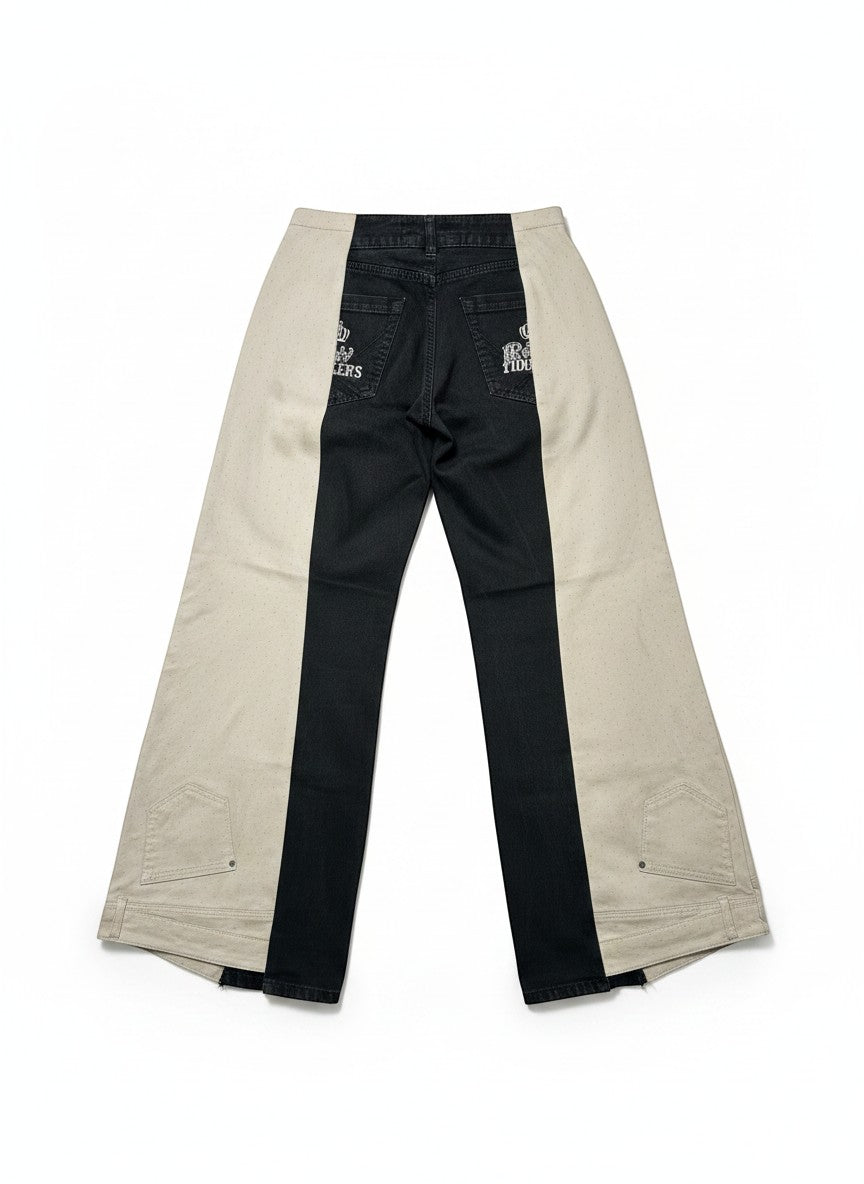 Thoughts Reworked black and beige patchwork wide leg denim jeans with subtle dot pattern on beige panels.