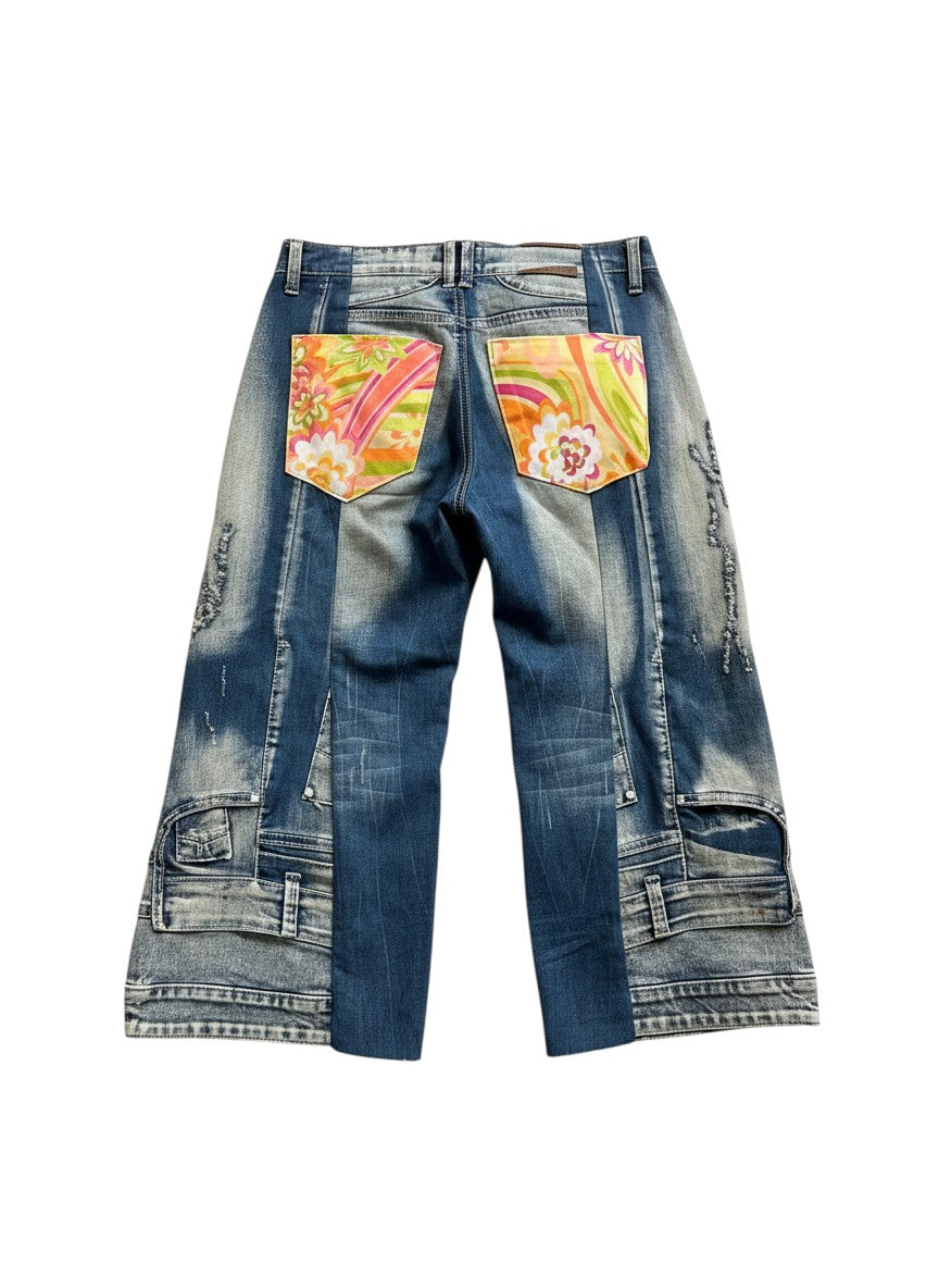 Thoughts Reworked upcycled denim jorts with colourful floral print pocket patches. Cropped wide leg style.