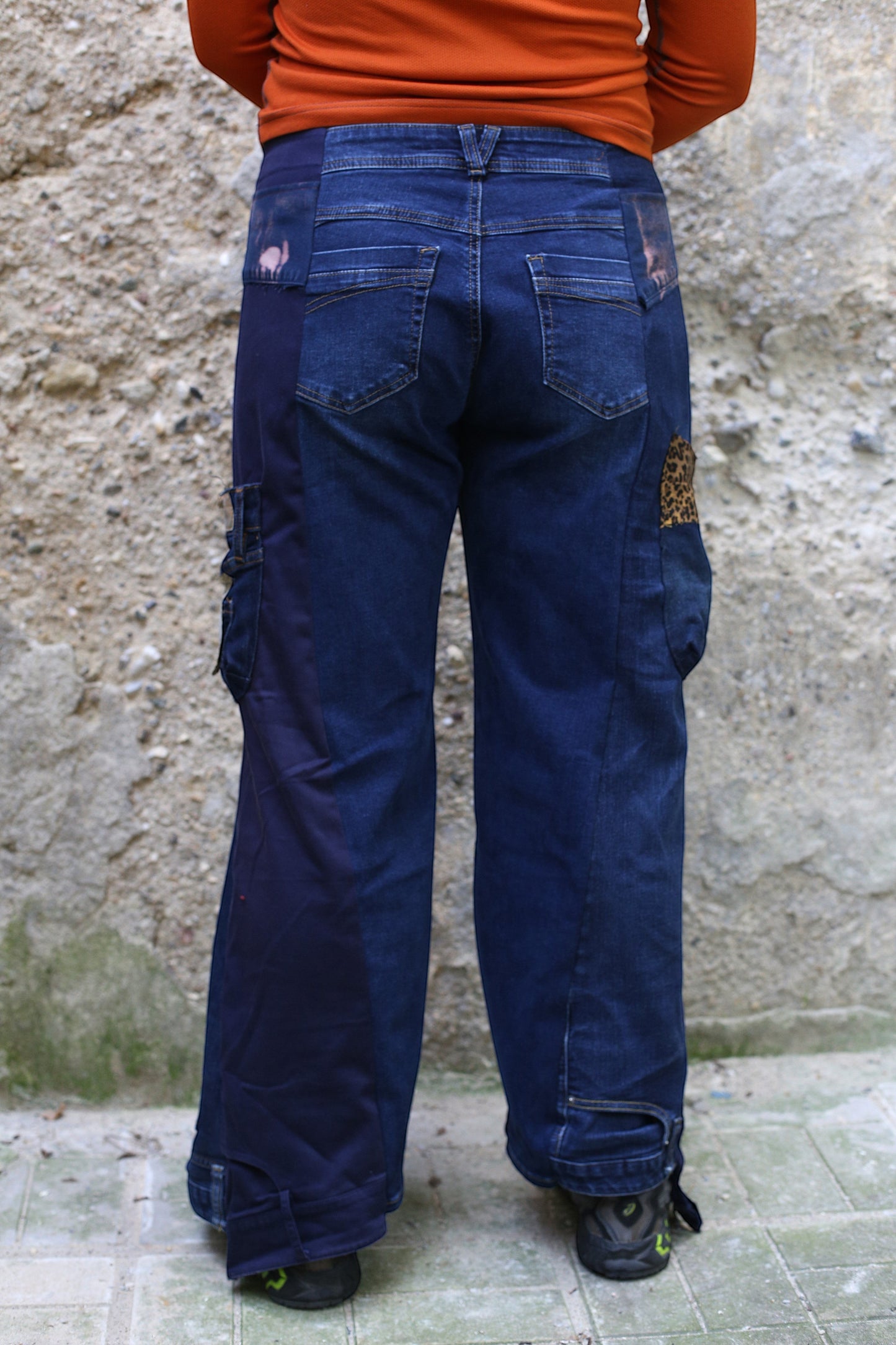 Thoughts Reworked wide leg cargo jeans made from preloved denim with subtle animal print patches and fabric scraps.