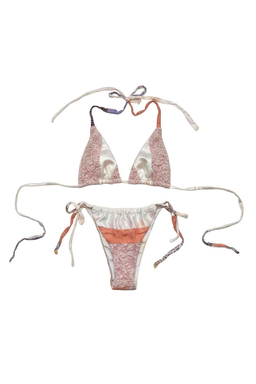 Thoughts Reworked pastel tie-dye patchwork bikini set with lace trim. Halter top and tie-side bottoms.
