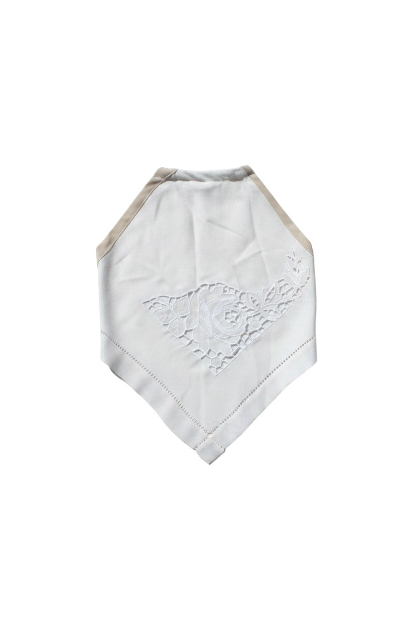 Thoughts Reworked white embroidered bandana halter top with floral cut-out details and beige straps.